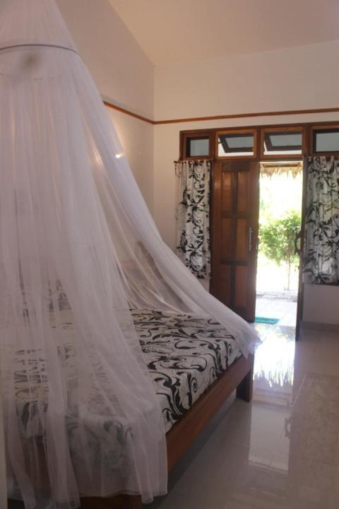 Eco Trekking Lodge, Bar & Jungle Tour'S Bukit Lawang Esterno foto